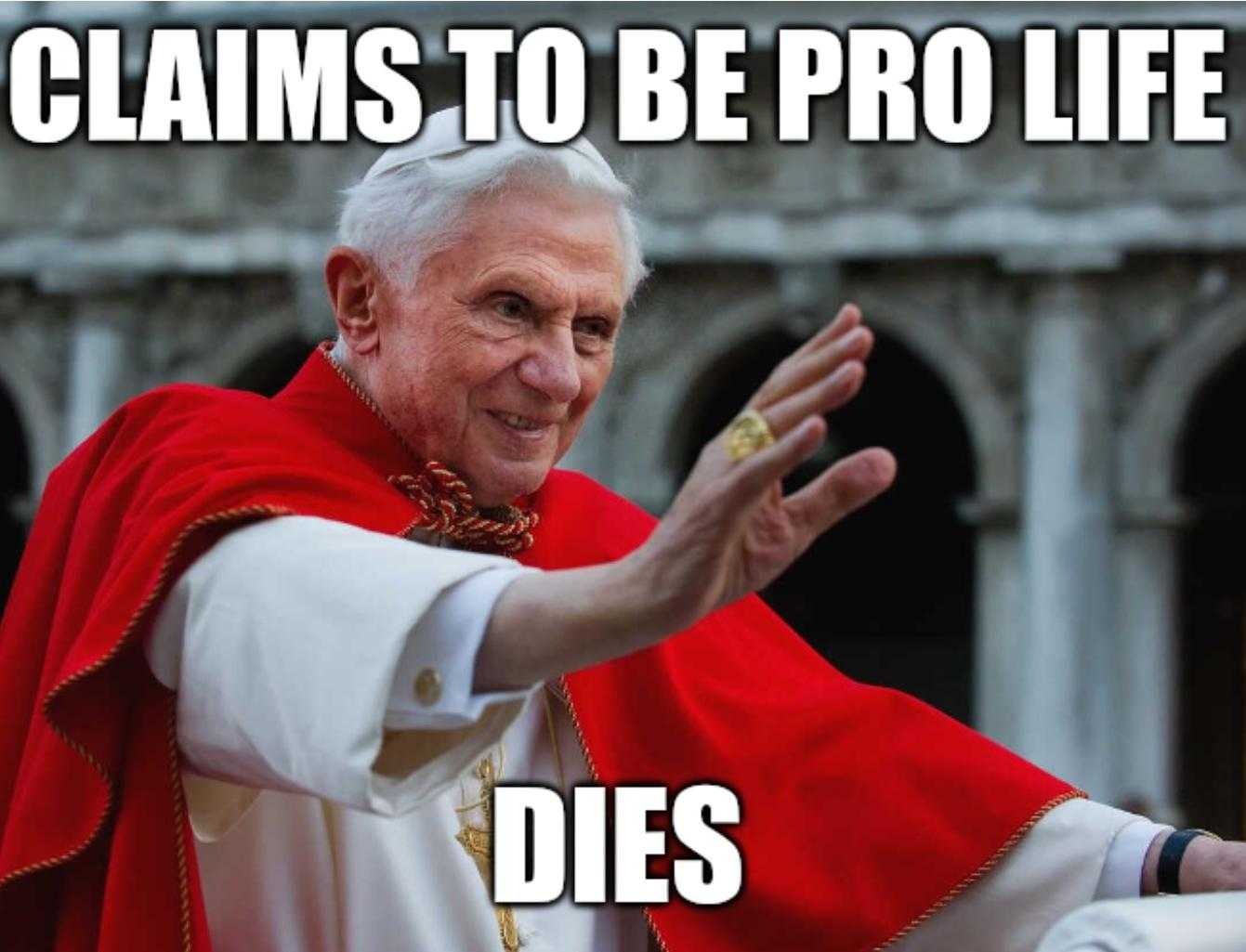 pope with a red cape and a red cape on