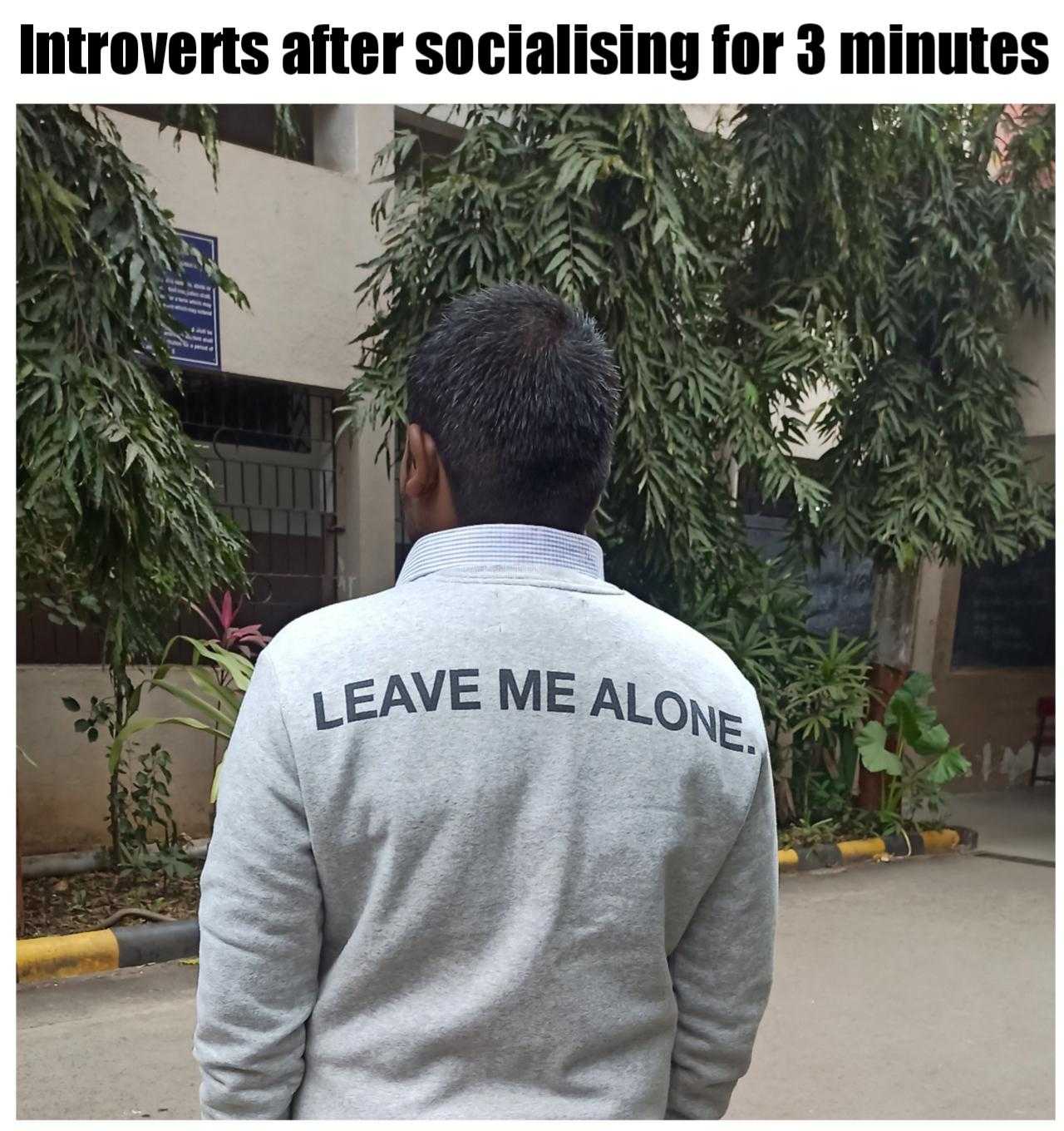 man in a sweatshirt with the words leave me alone