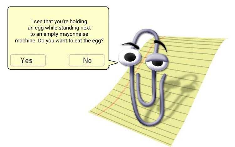 a close up of a paper clip with a cartoon face on it