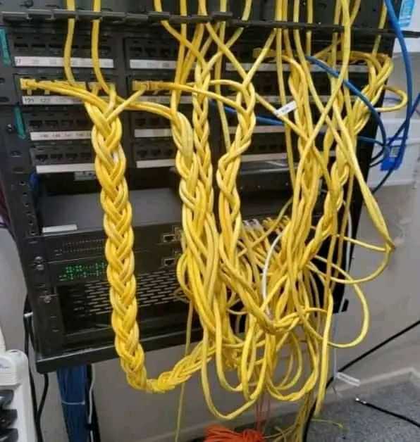 there are many cables and wires that are connected to a computer