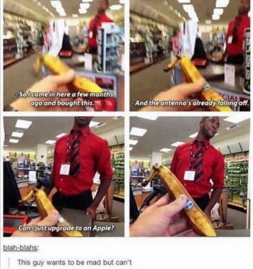 a close up of a person holding a banana in a store