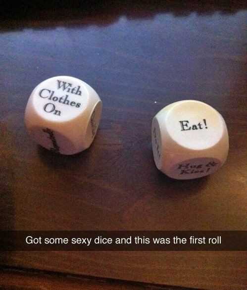 two dice with words on them sitting on a table