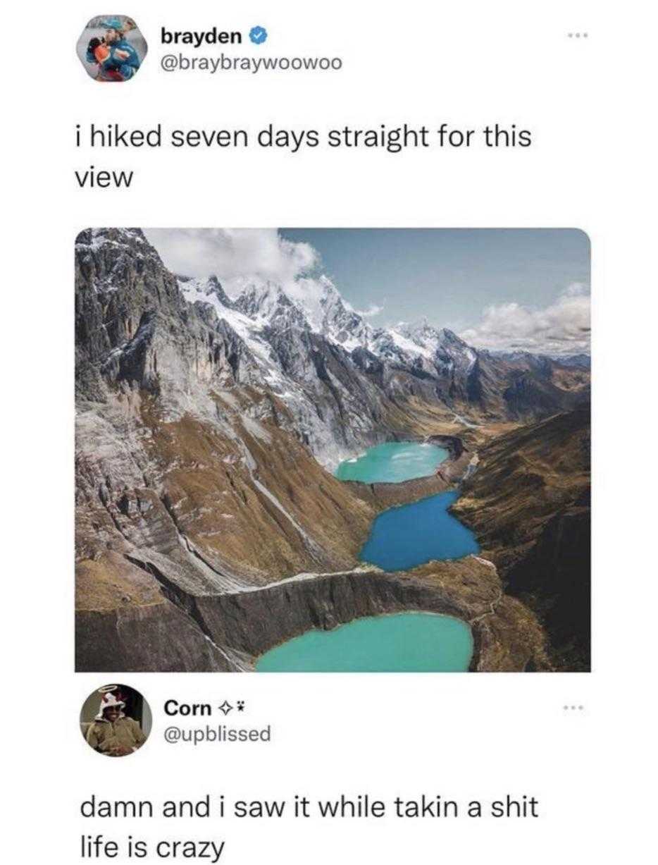 a twee picture of a lake in the mountains with a mountain in the background