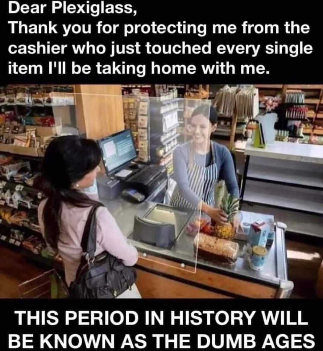 a woman standing at a cash register in a store with a woman behind her