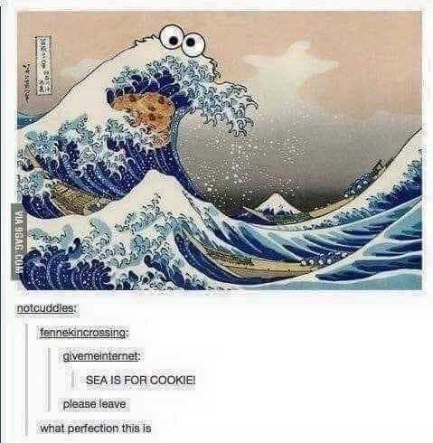 a close up of a picture of a wave with a cookie on it