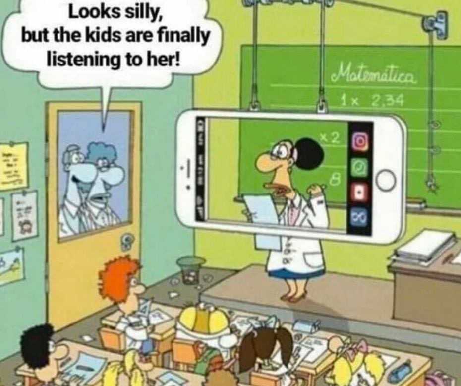 cartoon of a teacher in a classroom with a cell phone showing a cartoon of a teacher on the screen