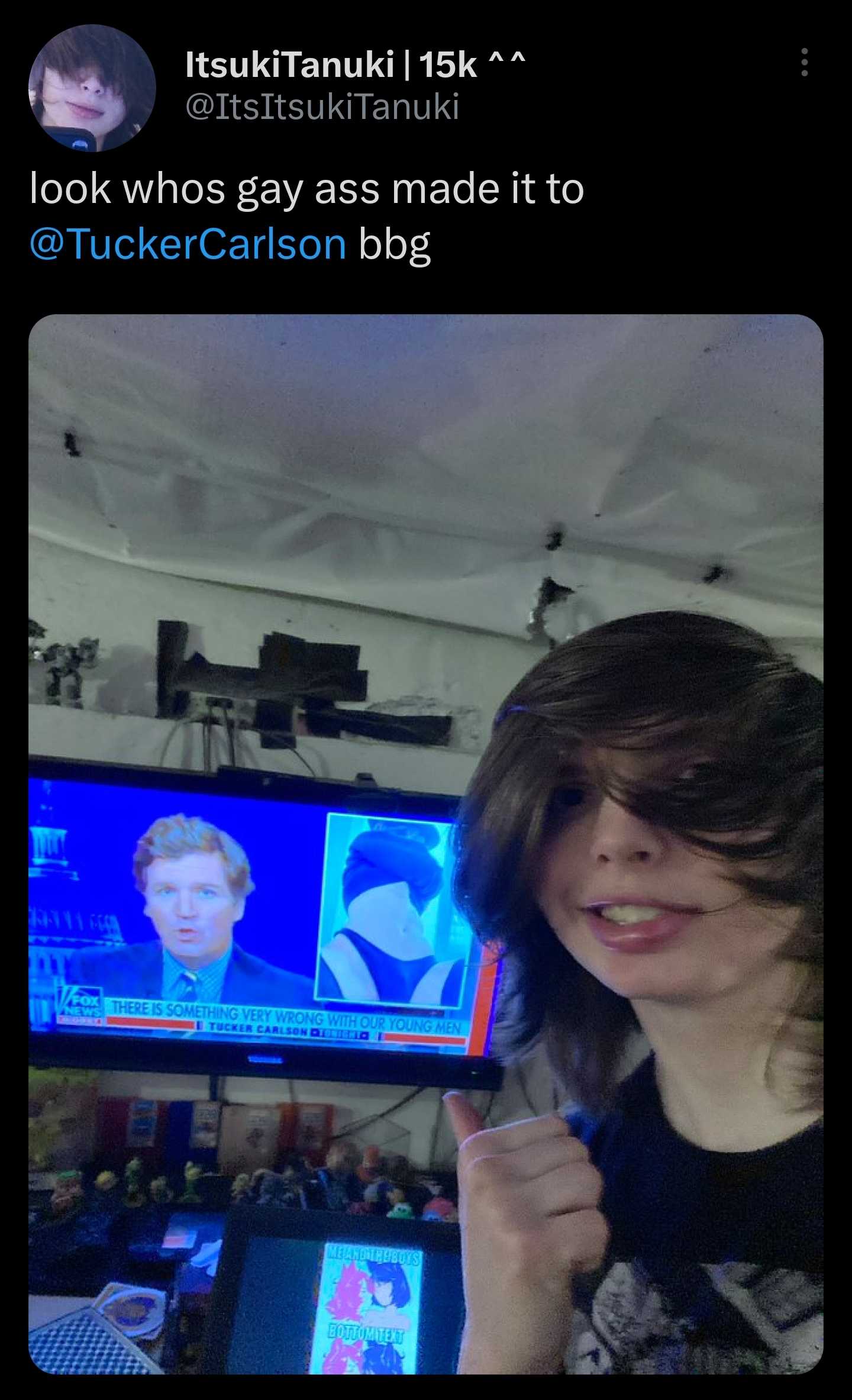 image of a woman holding a toothbrush in front of a tv