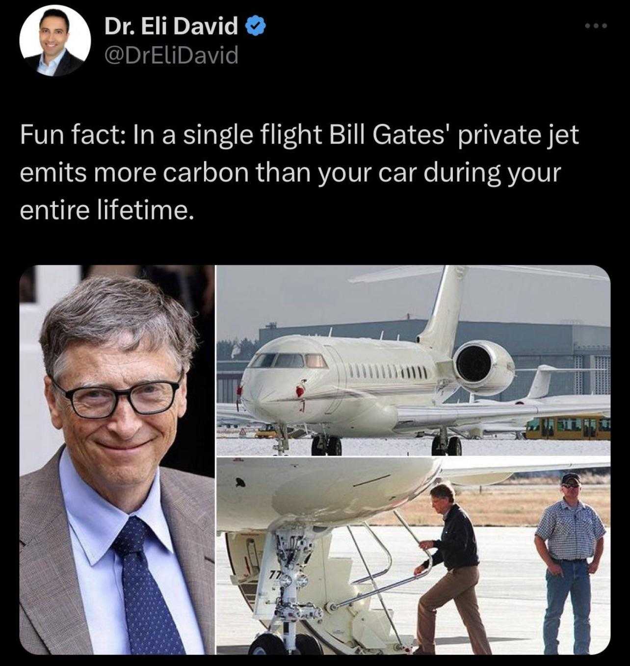 a close up of a person in a suit and tie next to a plane