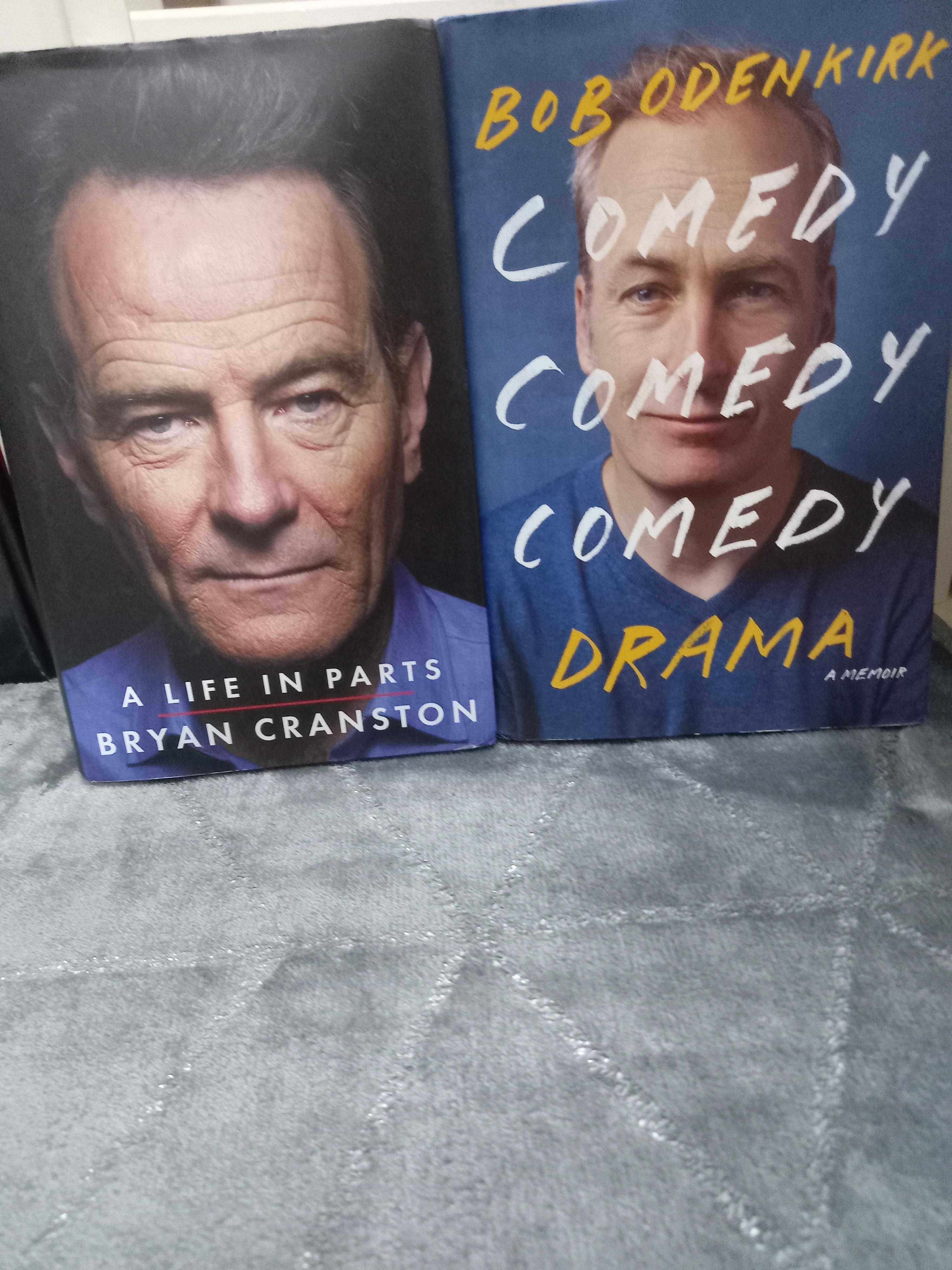 a close up of two books on a table with a book cover