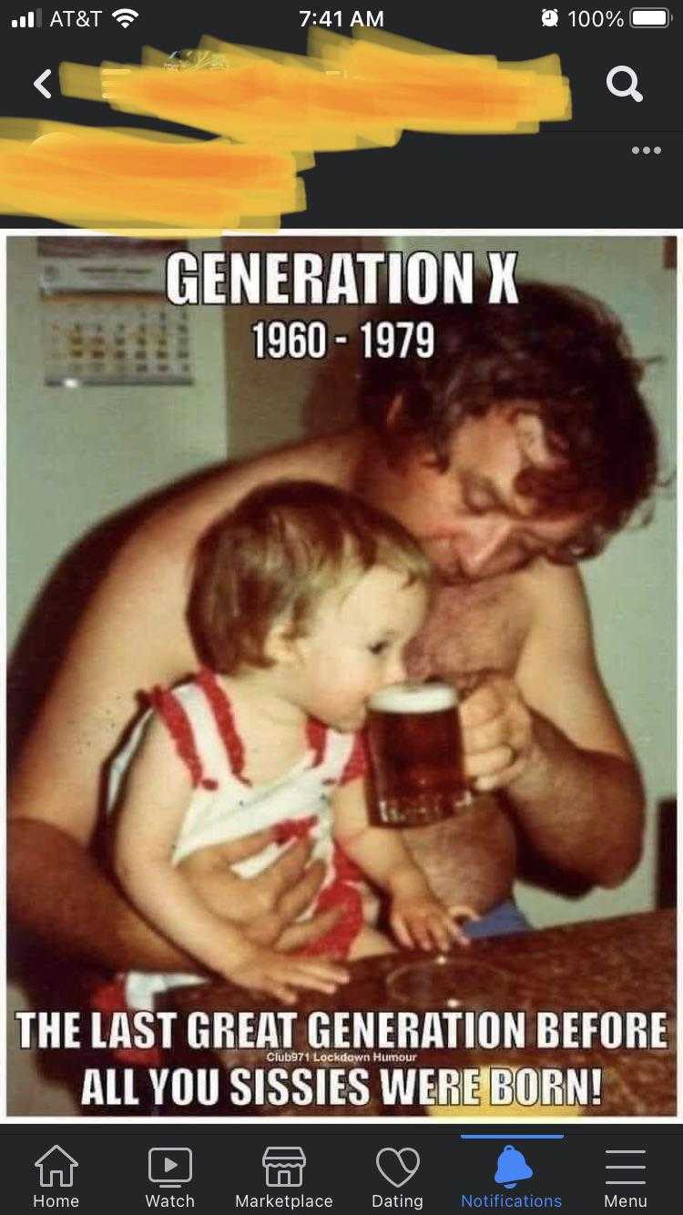 a close up of a person holding a child with a beer