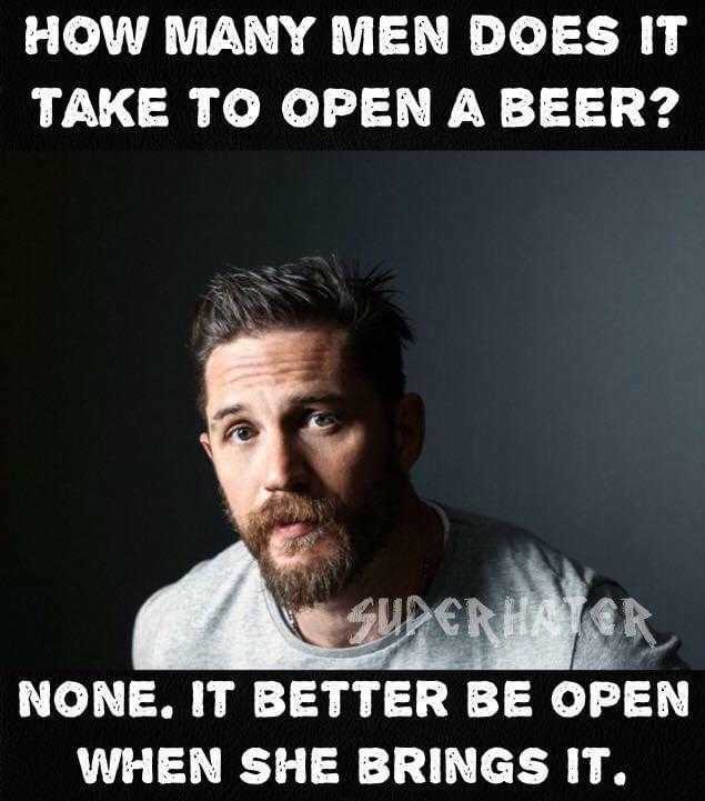 there is a man with a beard and a shirt that says how many men does it take to open a beer?