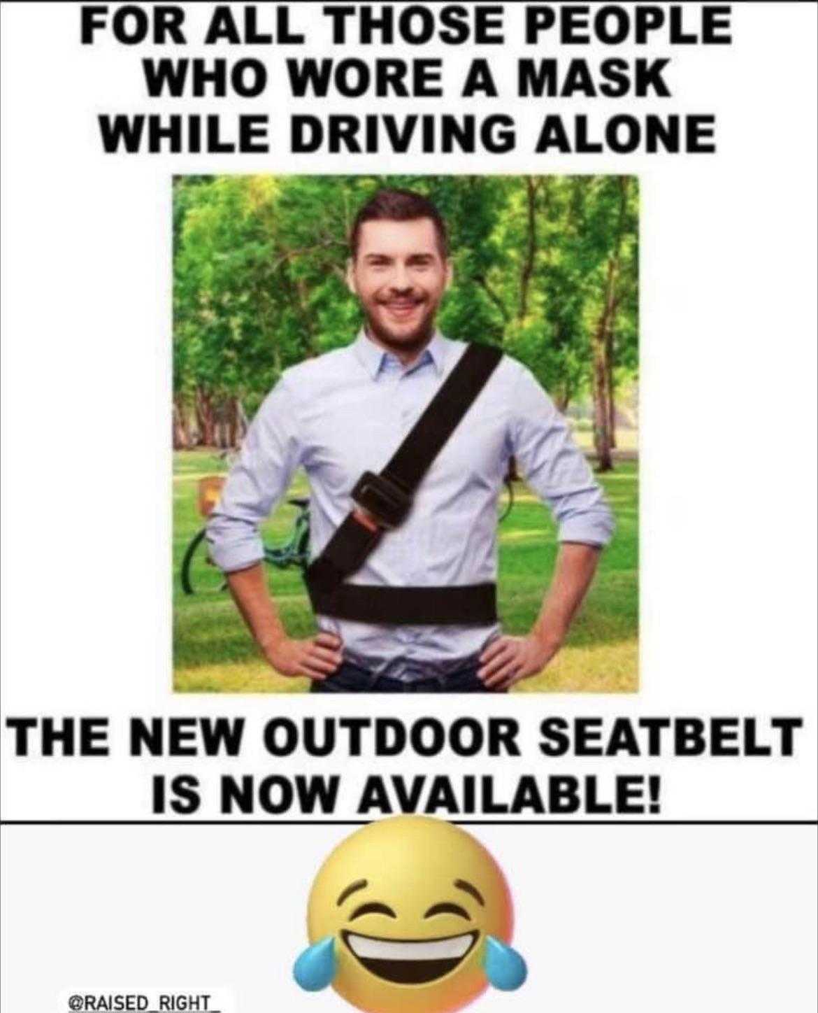 a man with a smile on his face and a sign that says, the new outdoor seatbelt is now