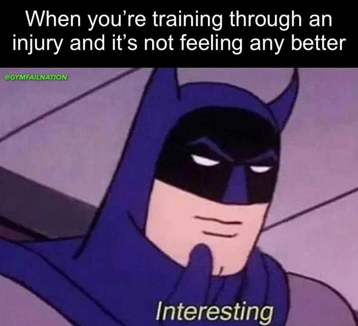 batman in a blue suit with a caption saying when you ' re training through an injury and it '