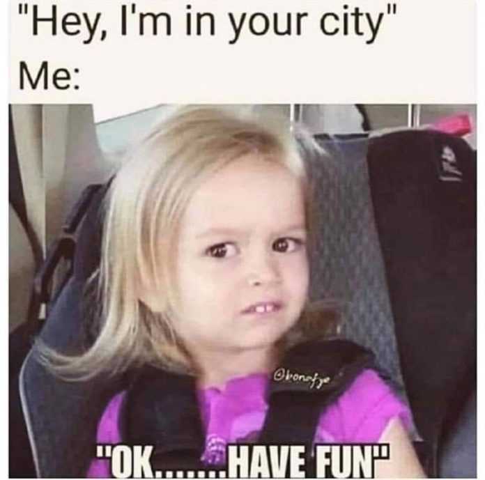 little girl in a car seat with a caption saying hey i ' m in your city