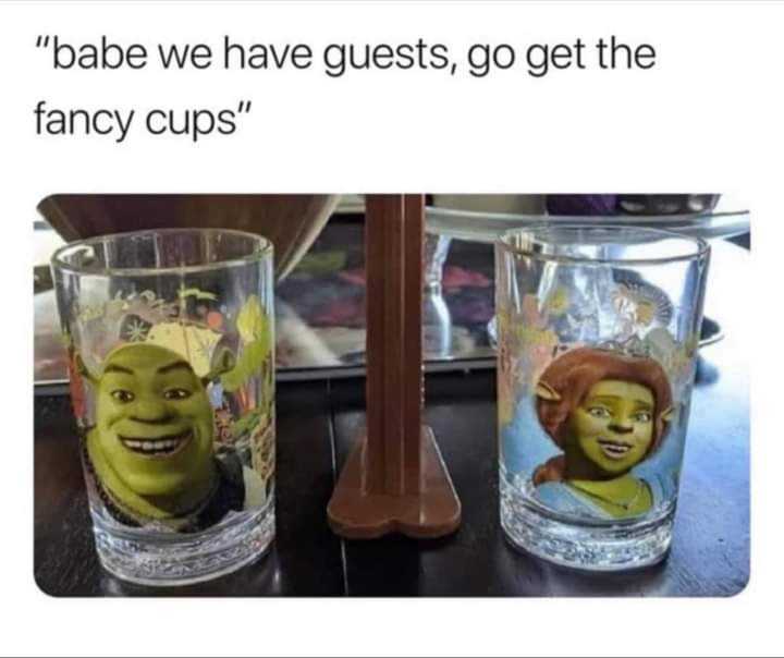 two glasses with pictures of a man and a woman on them