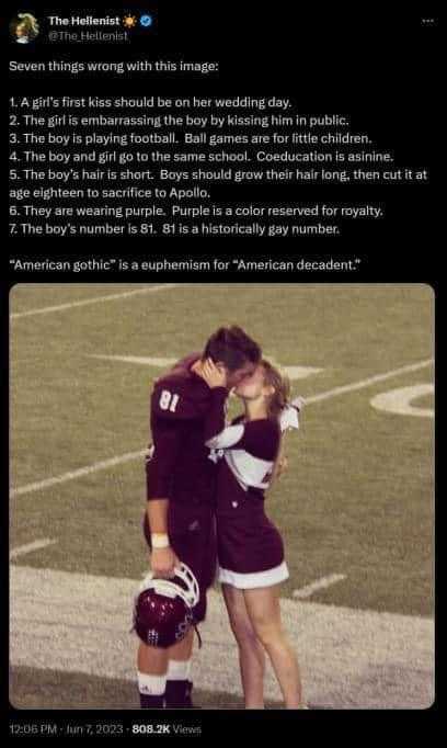 image of a couple kissing on the field