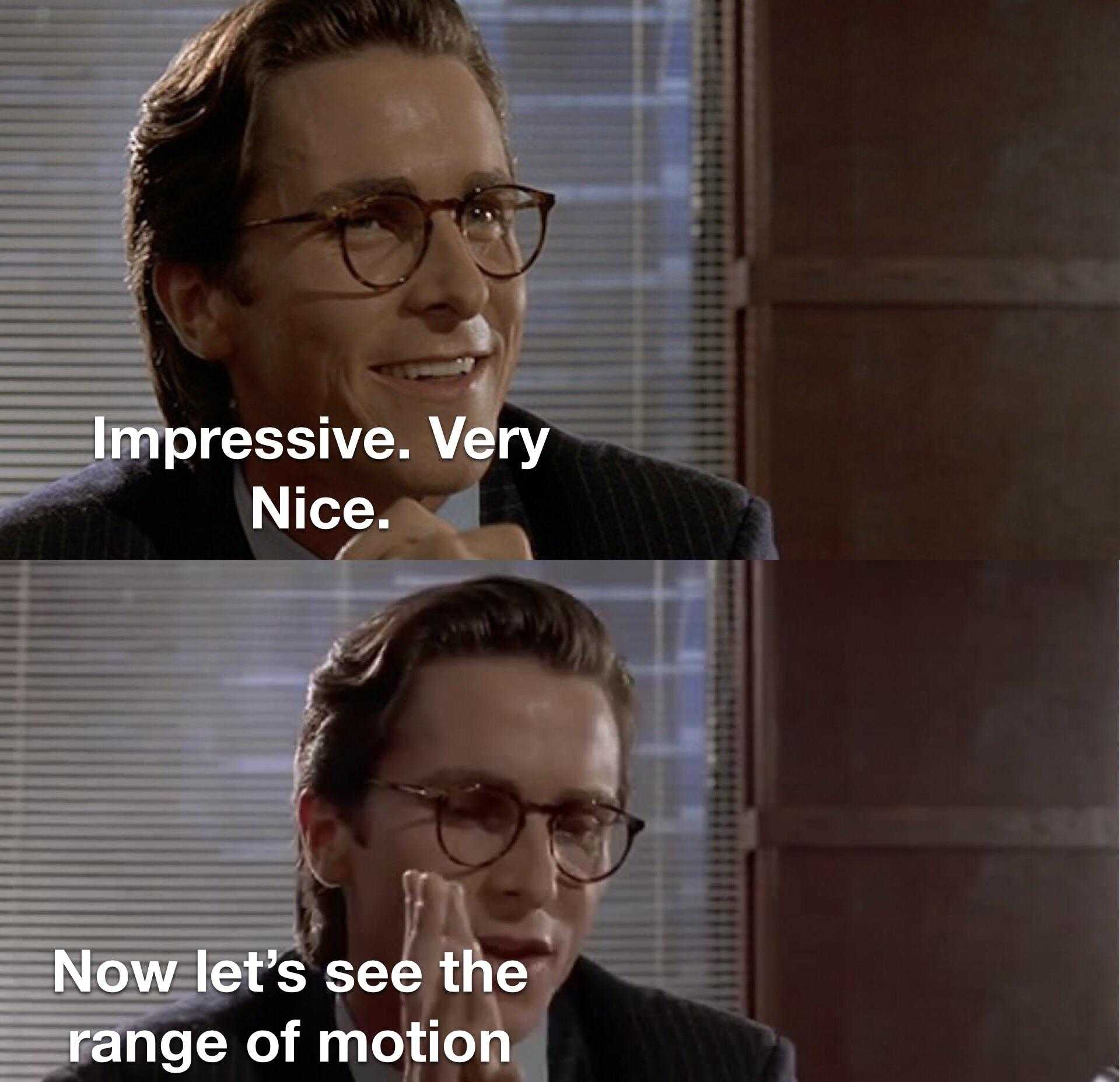 image of a man in a suit and glasses with a caption saying, ' i am not impressed very nice now let ' s see the range of motion