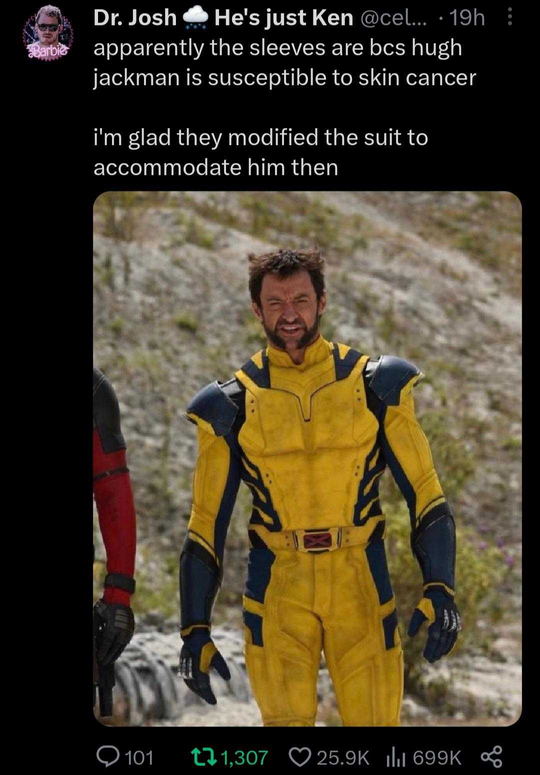 a man in a yellow suit and a black helmet standing next to a man in a red suit