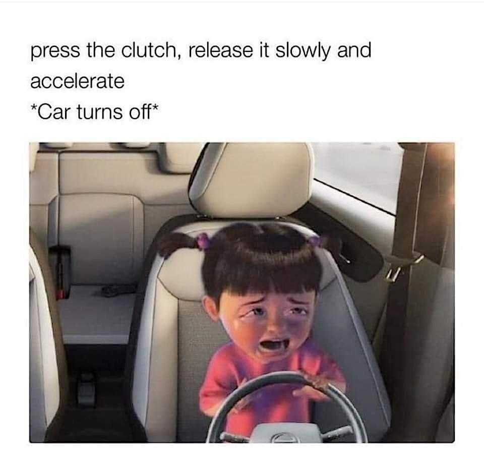 child in a car with a steering wheel and a caption that reads, press the clutch, release it slow and accelerate