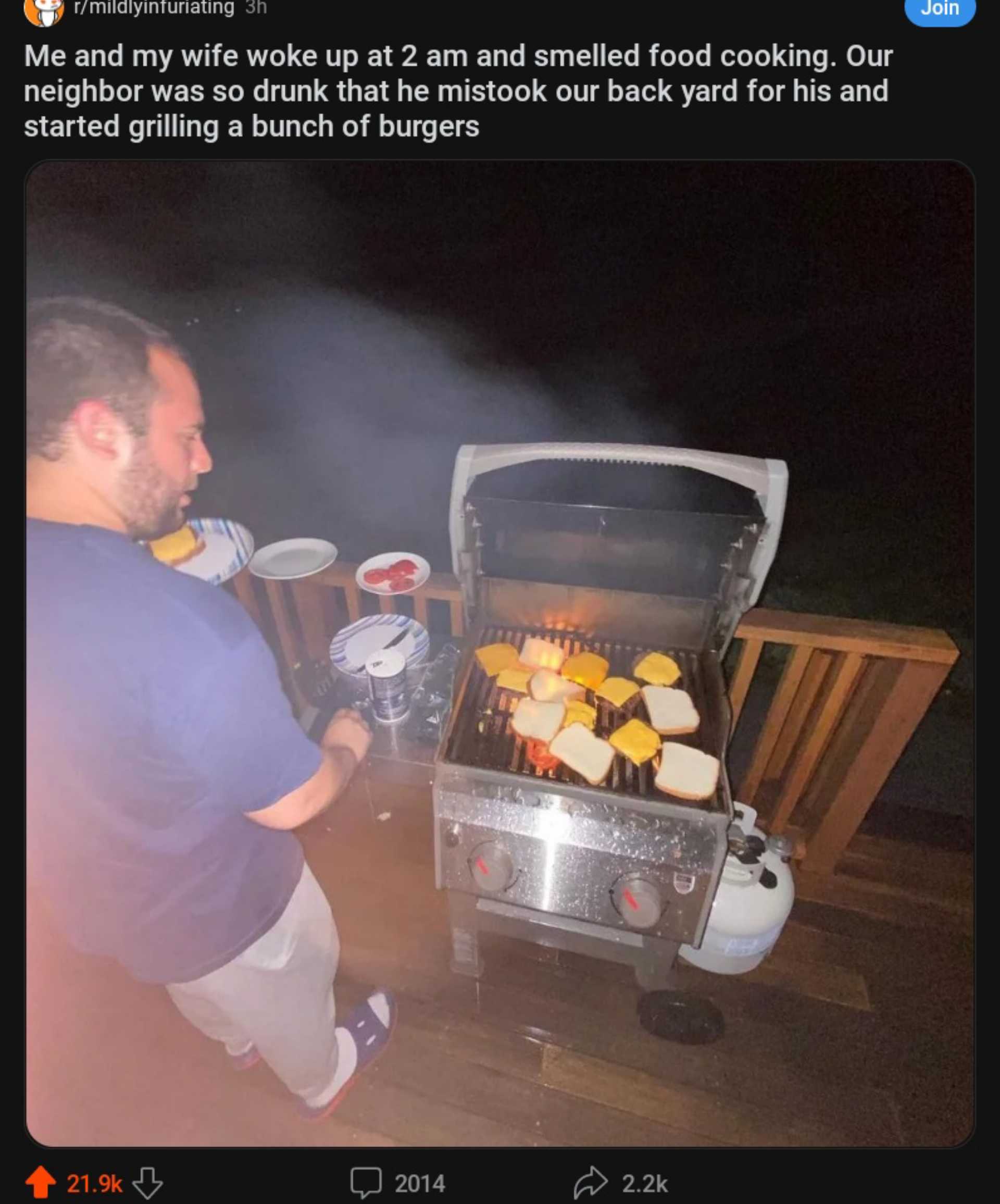 someone is grilling burgers on a grill with a beer