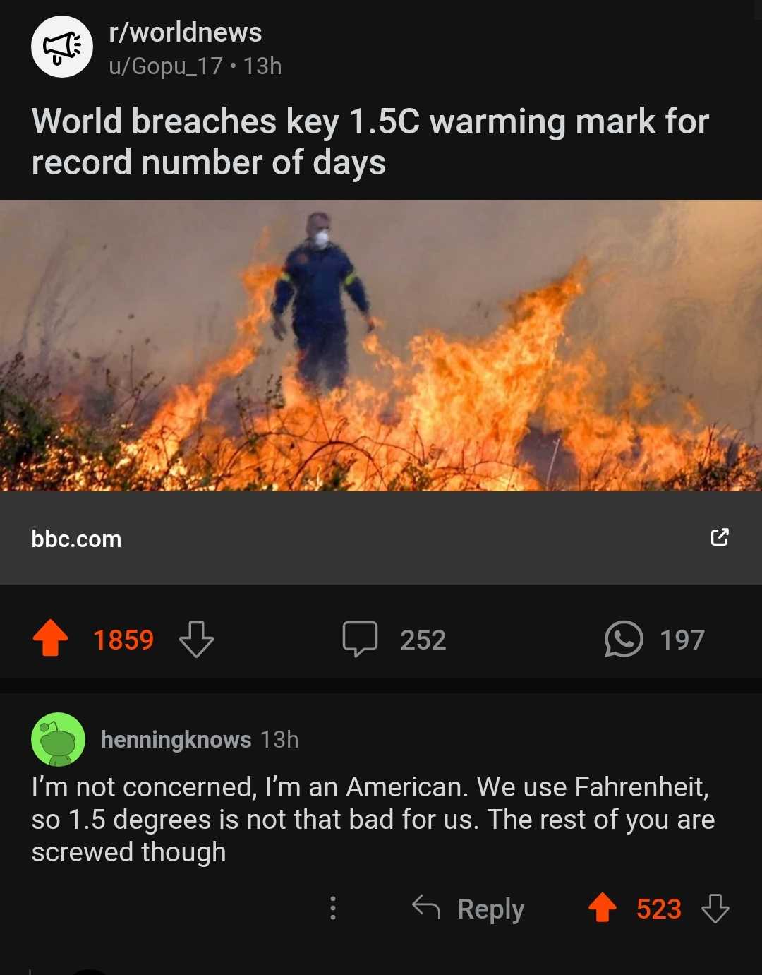 a close up of a person standing in front of a fire