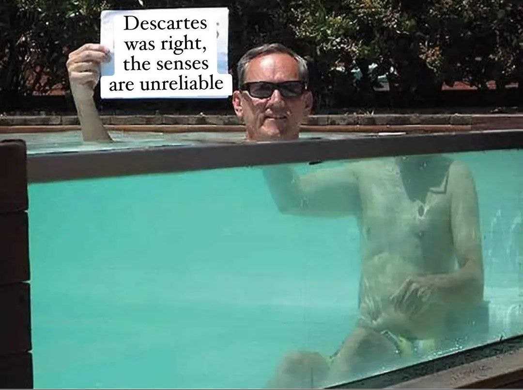 there is a man holding a sign in front of a pool