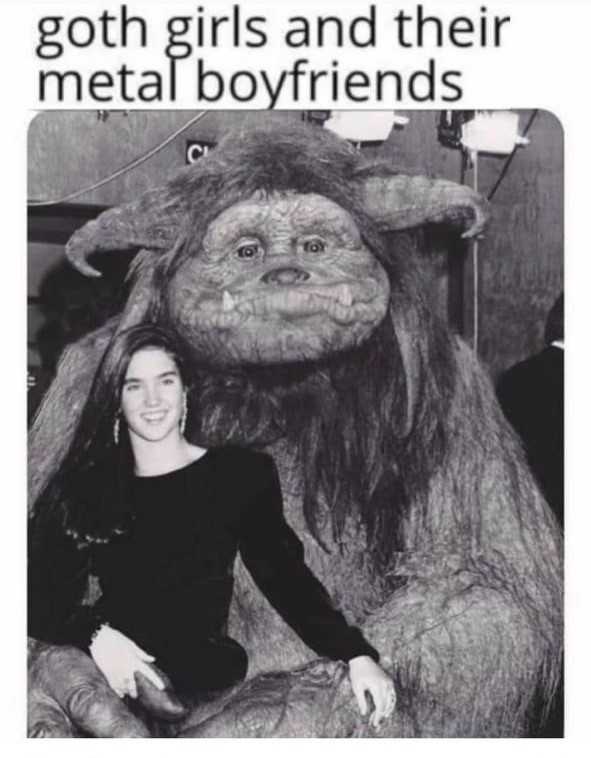 picture of a woman sitting next to a giant animal