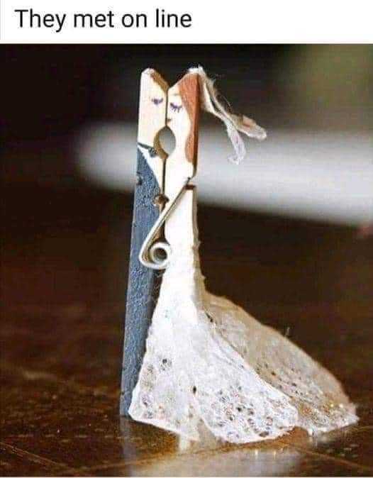 a close up of a clothes peg with a piece of cloth on it