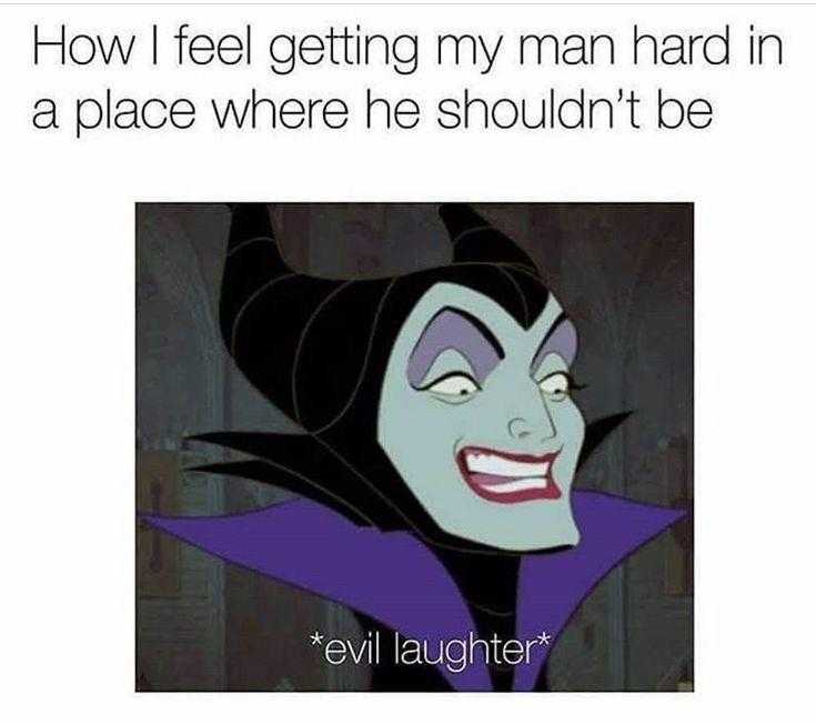 a cartoon picture of a maleficent with a purple cape and a smile