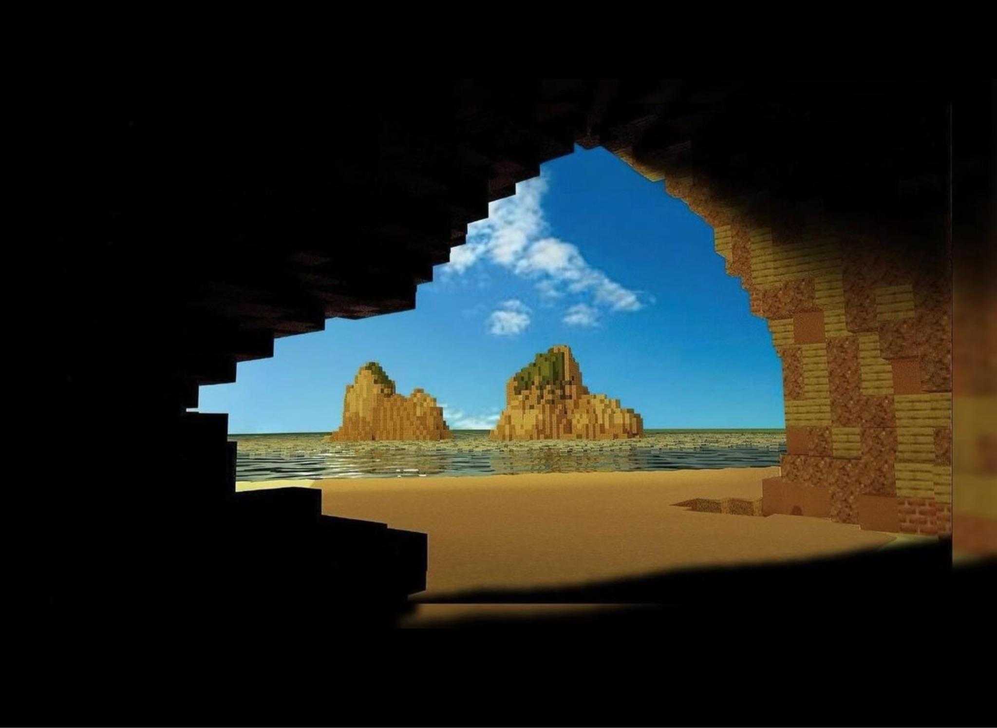 a view of a beach with a large rock formation in the distance