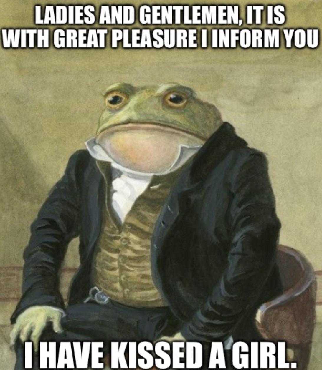 a close up of a frog in a suit sitting on a chair