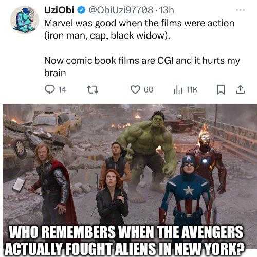 avengers are in the middle of a group of people who are standing in front of a building