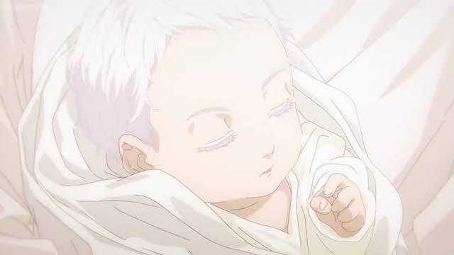 anime image of a baby wrapped in a blanket with his eyes closed