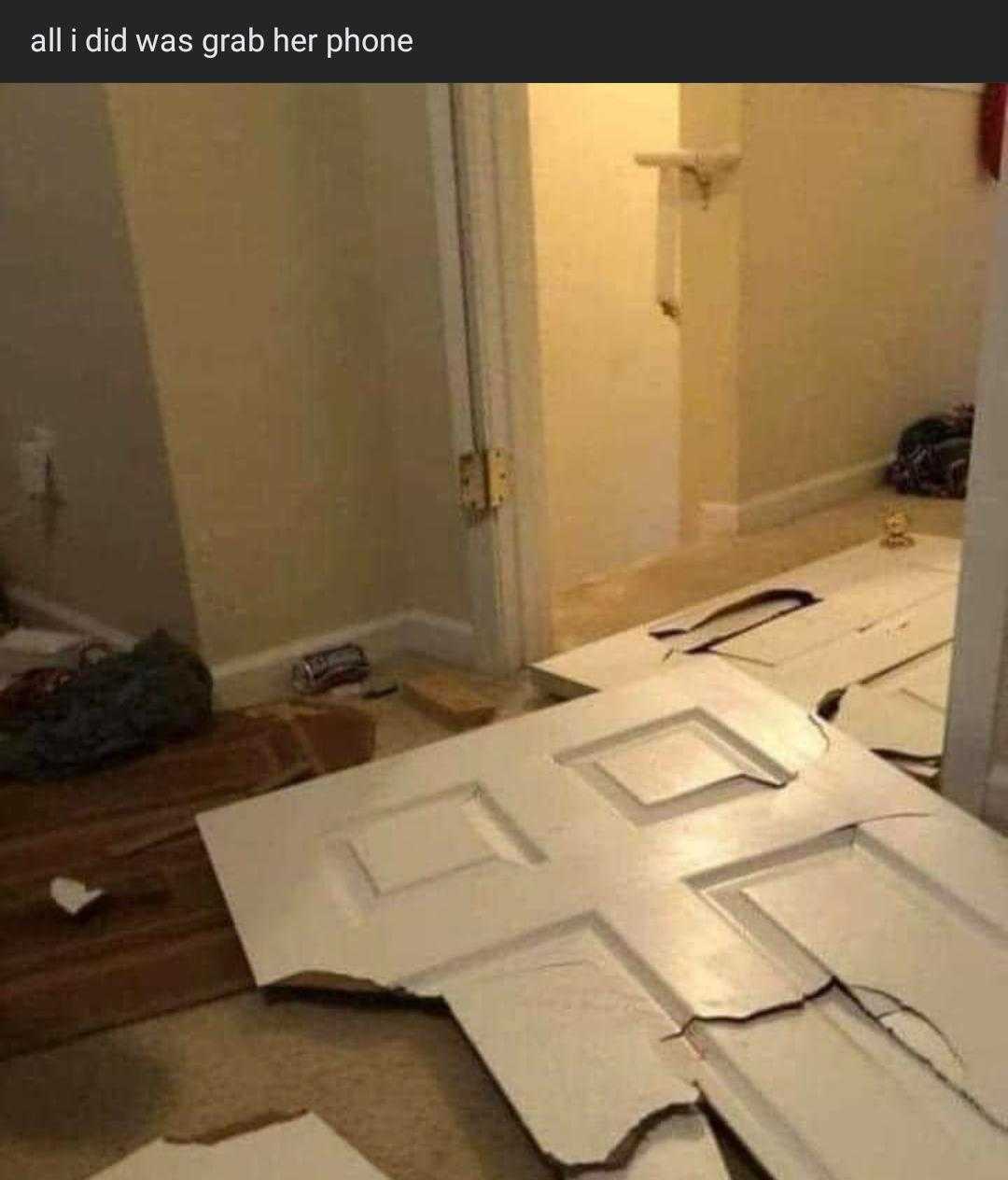 there is a room with a door and a floor with a lot of paper