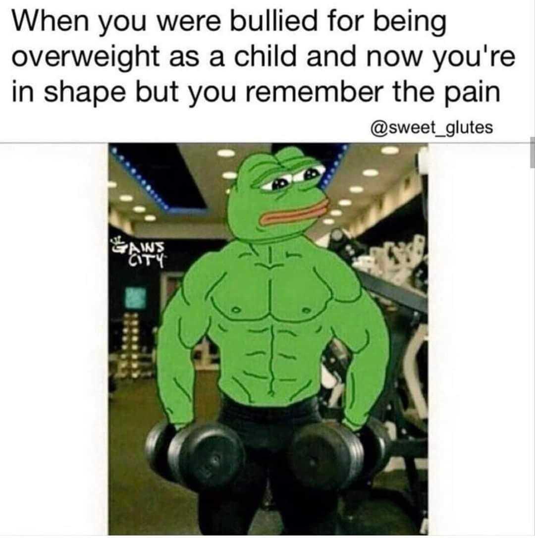 a cartoon frog with a dumb dumbs in a gym