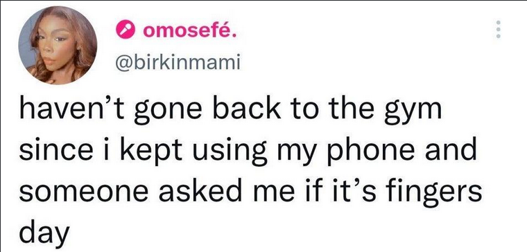 a tweet with a picture of a woman with a phone