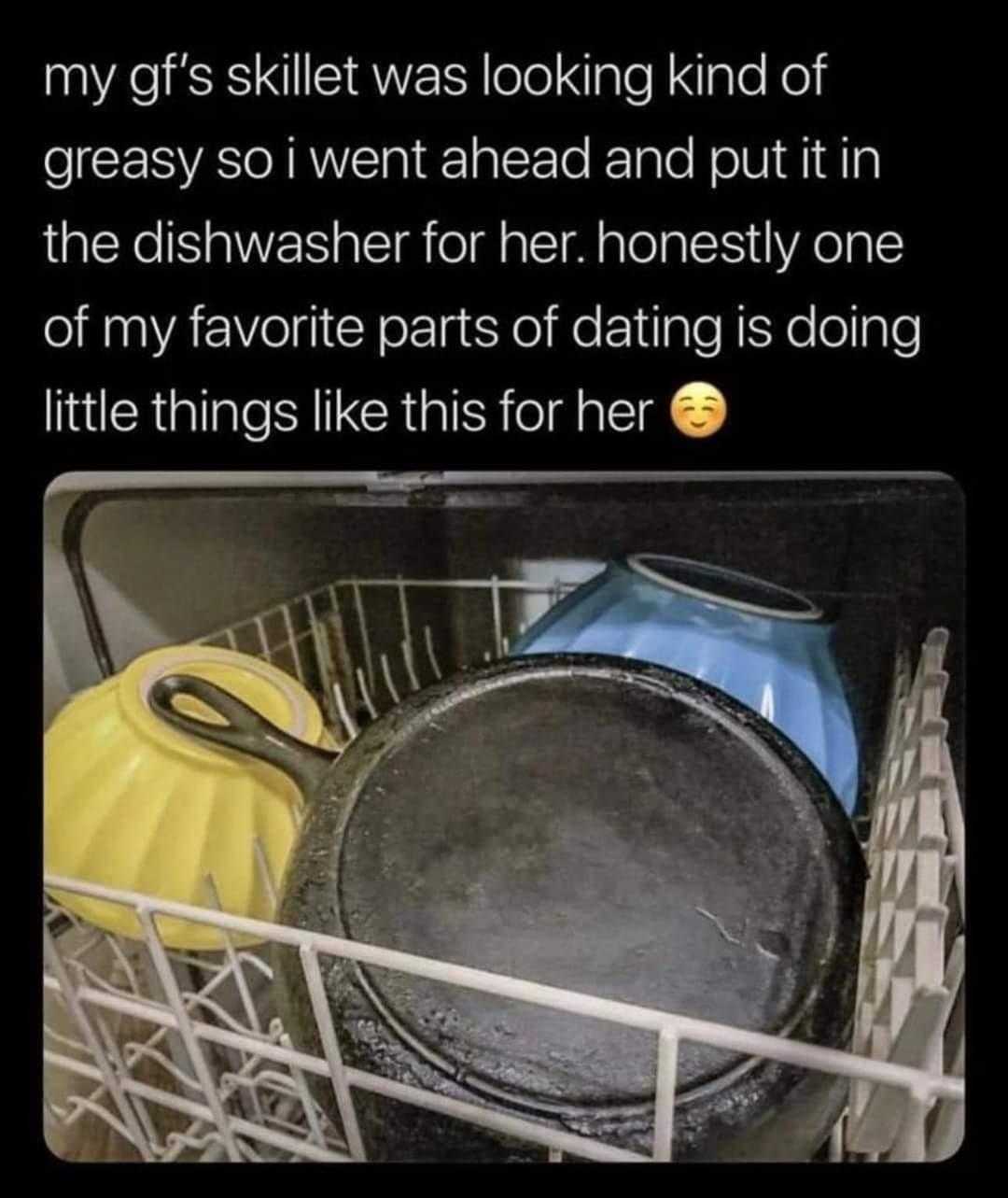 a close up of a dishwasher with a pan in it