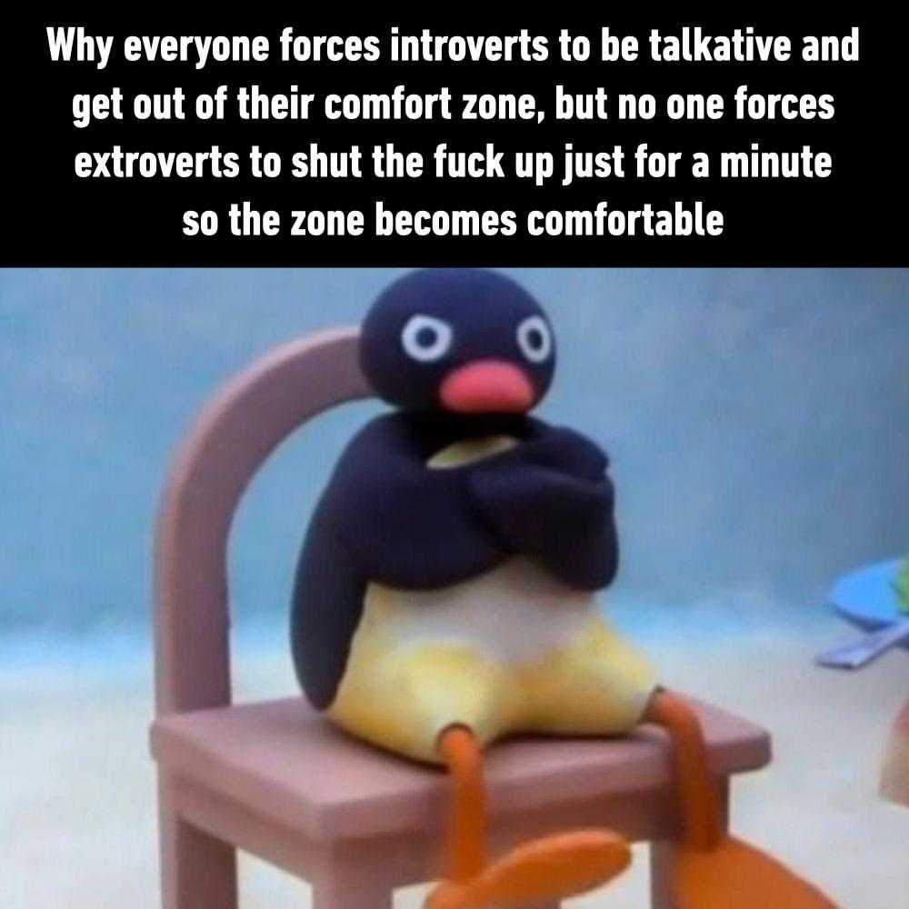 there is a toy penguin sitting on a chair with a caption