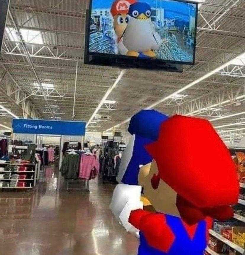 mario in a store with a video game on the wall