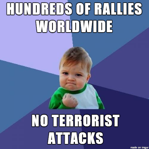 a picture of a kid with a fist in his hand and the words hundreds of rally worldwide no terrorist attacks