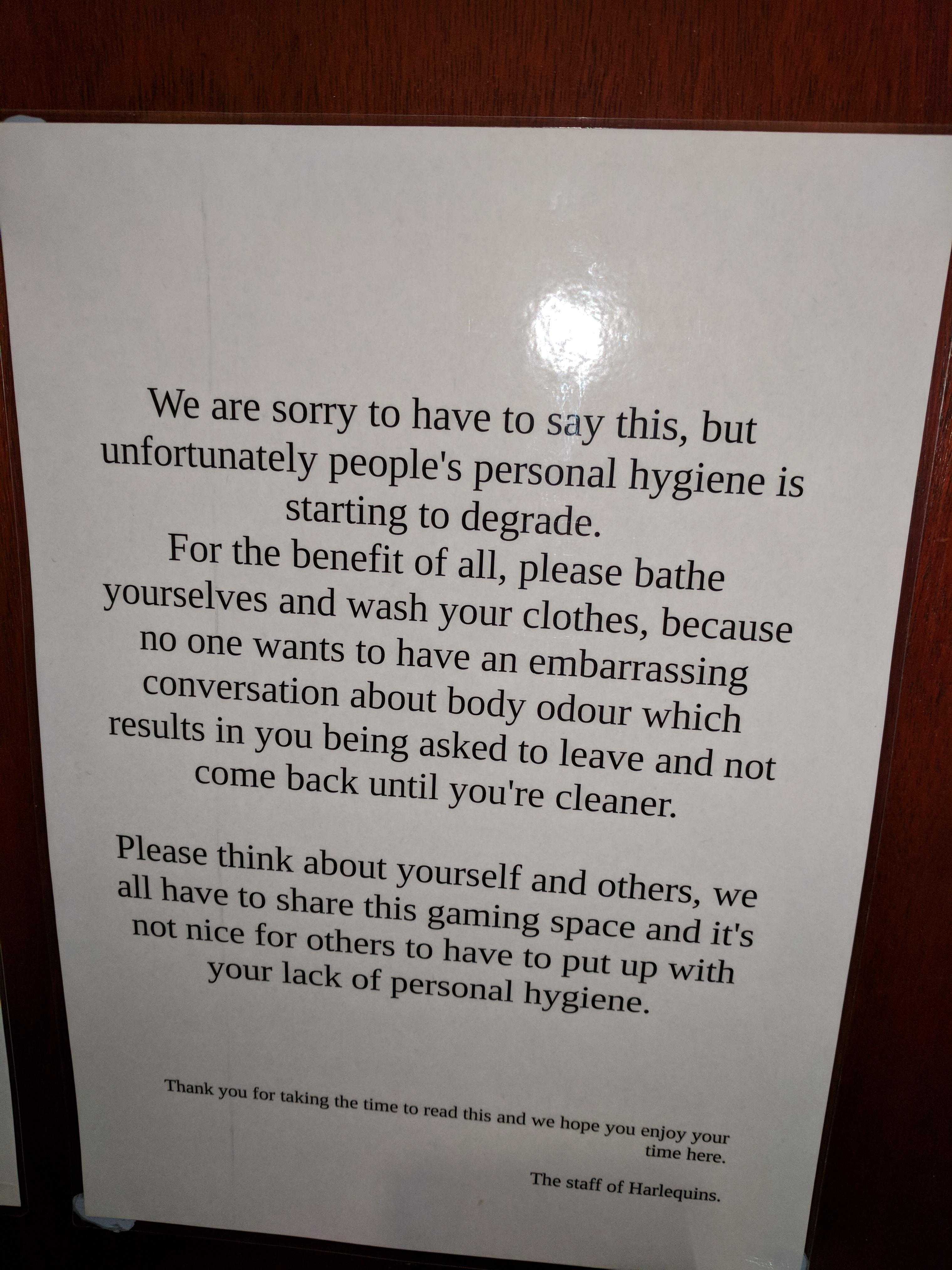 there is a sign that says we are sorry to have to eat this, but unfortunately people ' s personal hygiene is starting to depressate