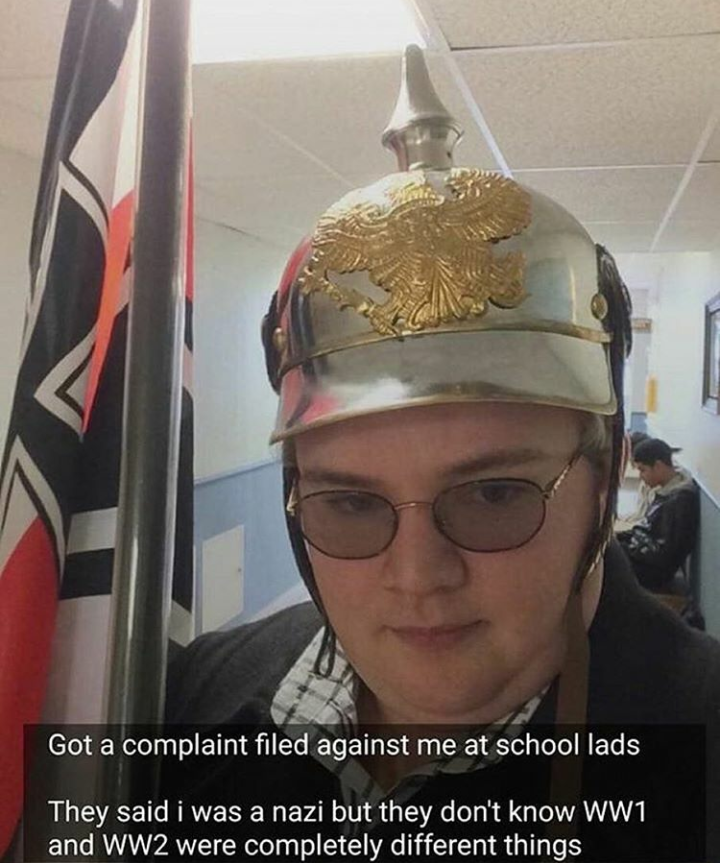 man wearing a helmet with a gold eagle on it