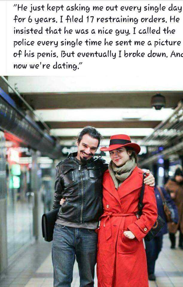 there is a man and woman standing together in a subway station