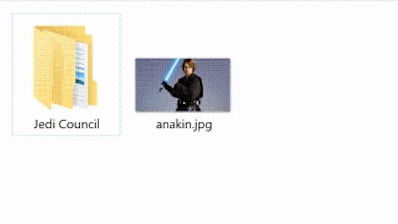 a close up of a person holding a light saber in front of a folder