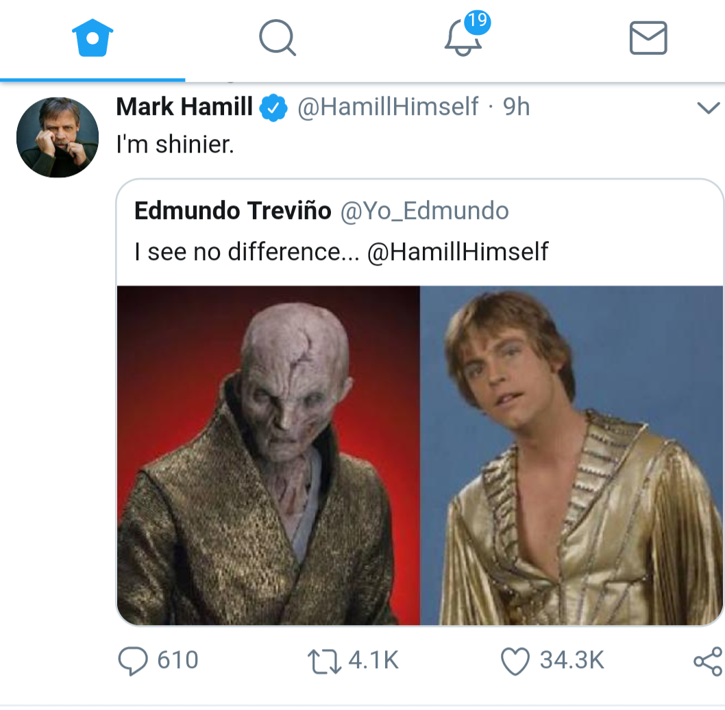 a close up of a person on a twitter account with a picture of a man in a gold suit