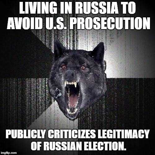 a wolf with its mouth open and its mouth wide open, saying living in russia to avoid us prosecution