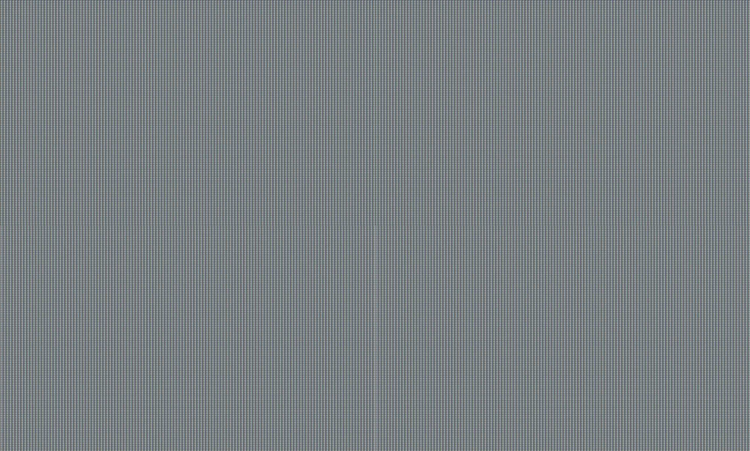 a close up of a gray background with a small square pattern