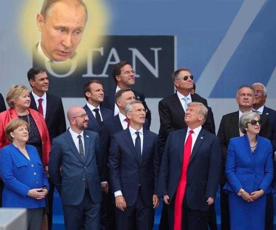 image of a group of people standing in front of a banner