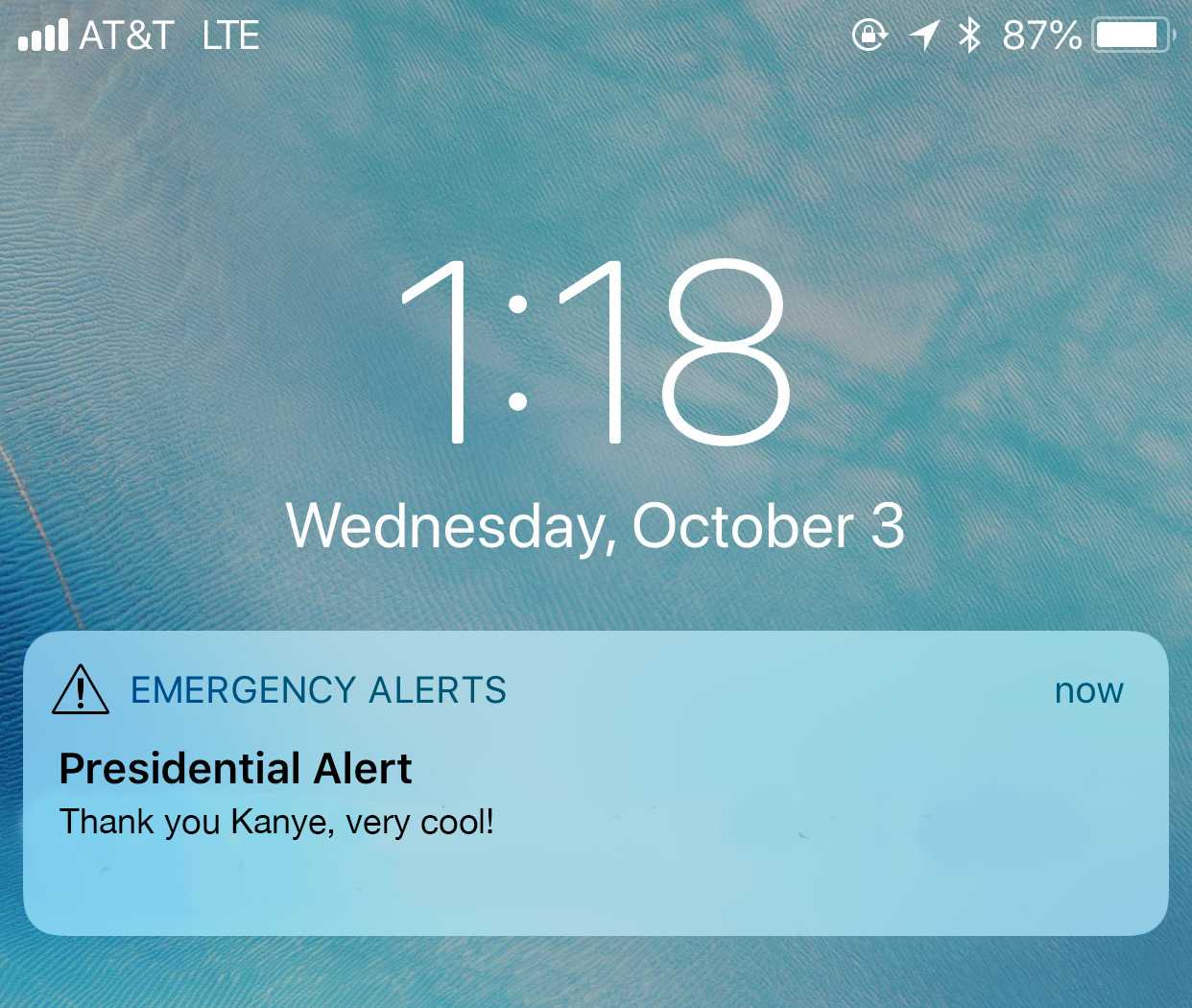 message on a cell phone with a message stating it is an emergency alert