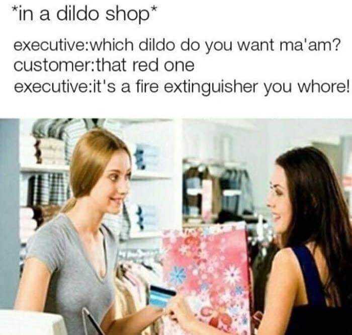 a woman is talking to another woman in a store